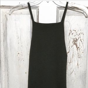 Mini dark green dress. Crossed back.